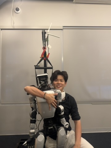 Jerry with a humanoid robot at NYU