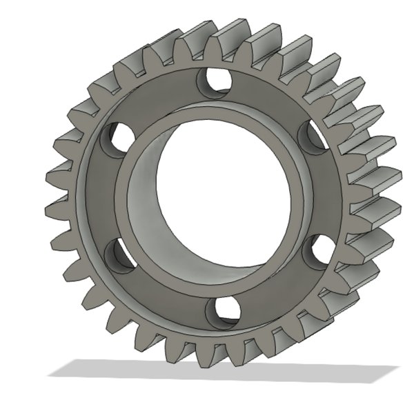 Gear with six drilled holes and a machined indent on the face.
