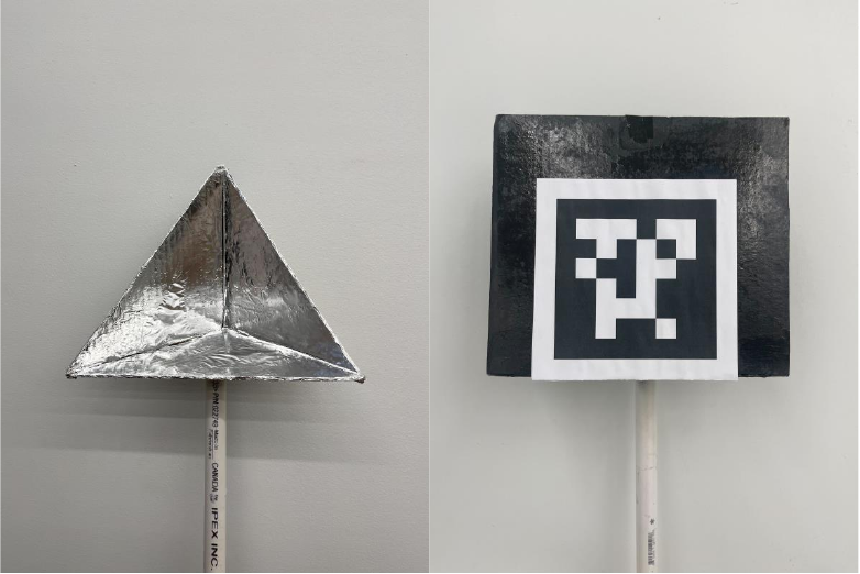 The trihedral retroreflector and the AprilTag mounted in front of it